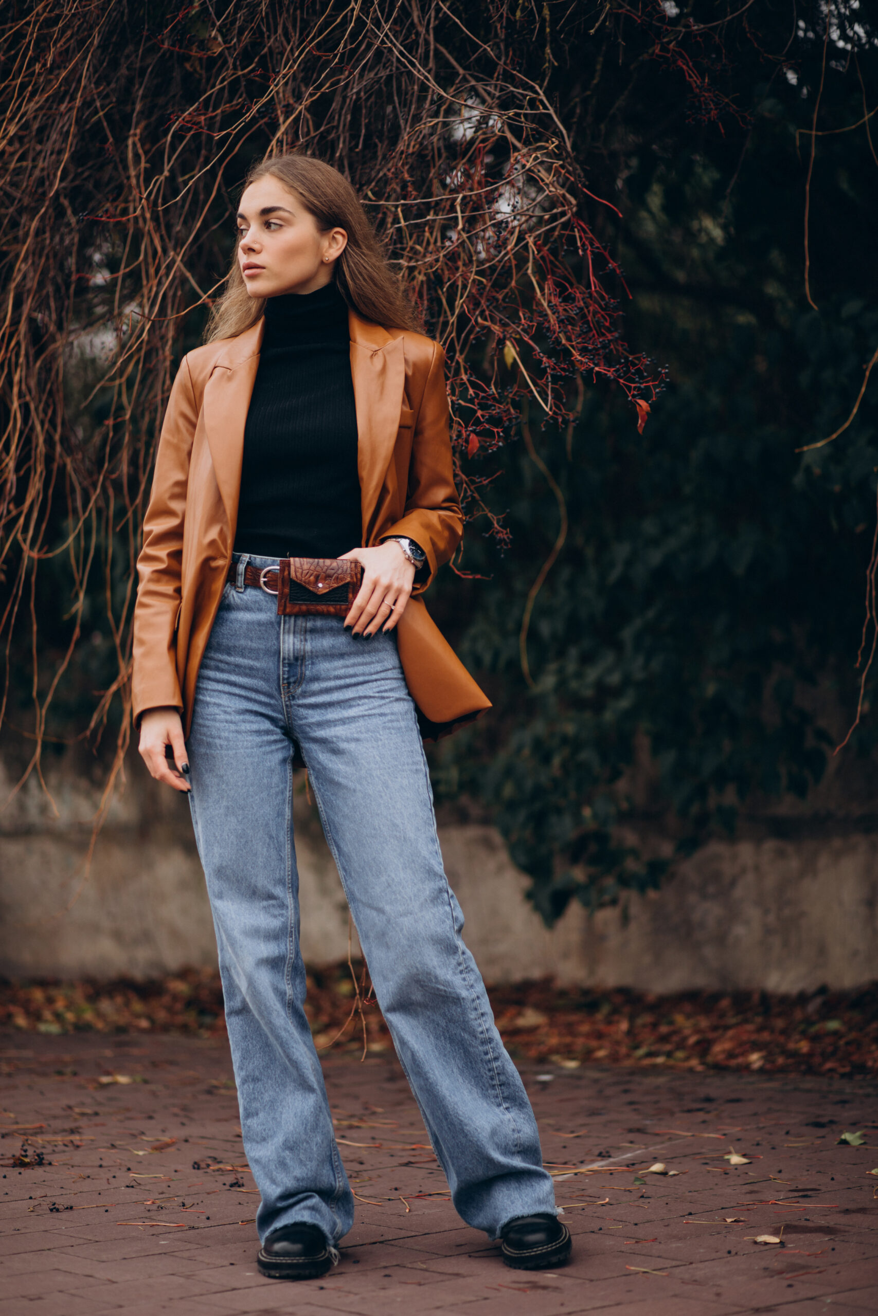 Young woman walking in park